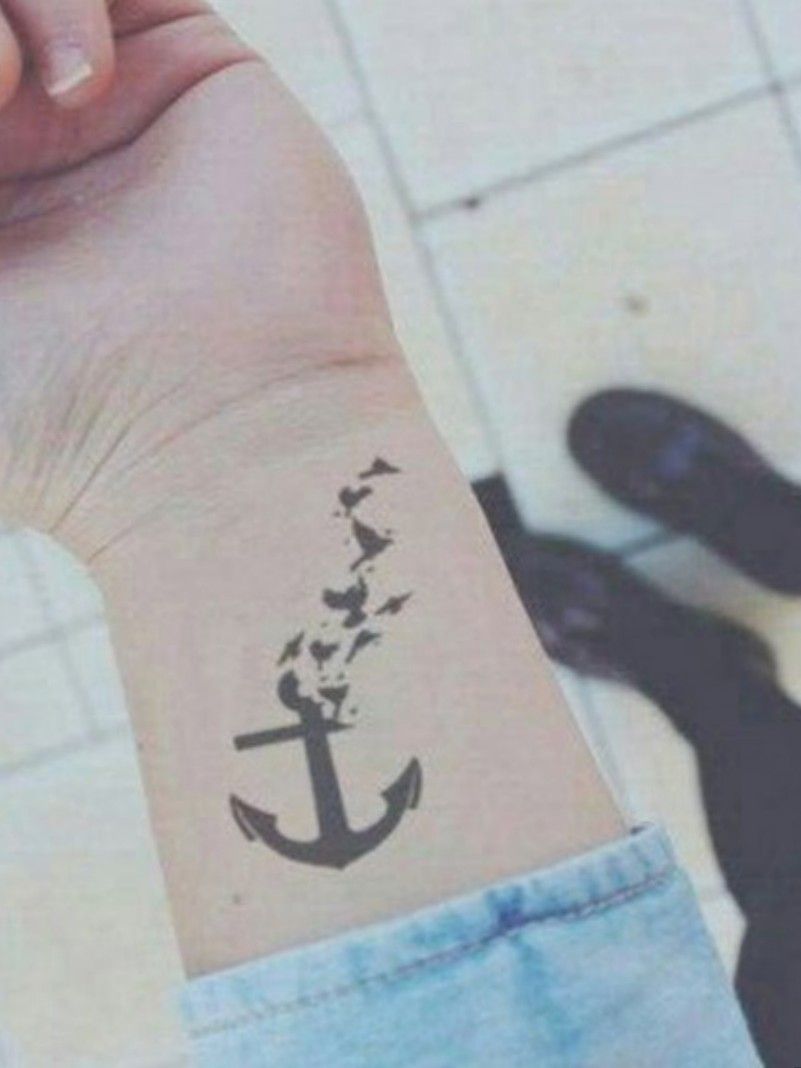 Small Old Style White Ink Anchor Tattoo On Wrist