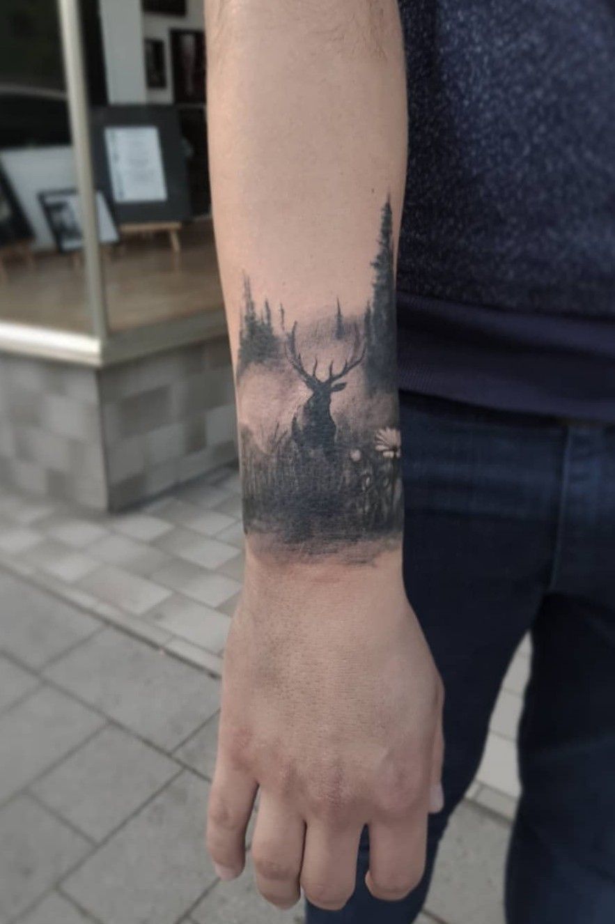 Colored deer tattoo on the wrist  Deer tattoo Cool small tattoos Tattoos