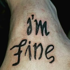 Double meaning tattoo."I'm fine""Save me" 
