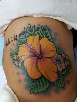 Hibiscus and plummeria flowers on ribs. 