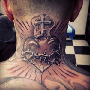 #religion #religioustattoo #sacredheart #blackandgrey Neck tattoo of Jesus heart of thorns by Steve Soto.