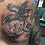 Awesome black and grey chest piece by John Sweeney #blackandgrey #chestpiece #johnsweeney #raven #map #worldmap #compass #hardknoxtattoo #ny