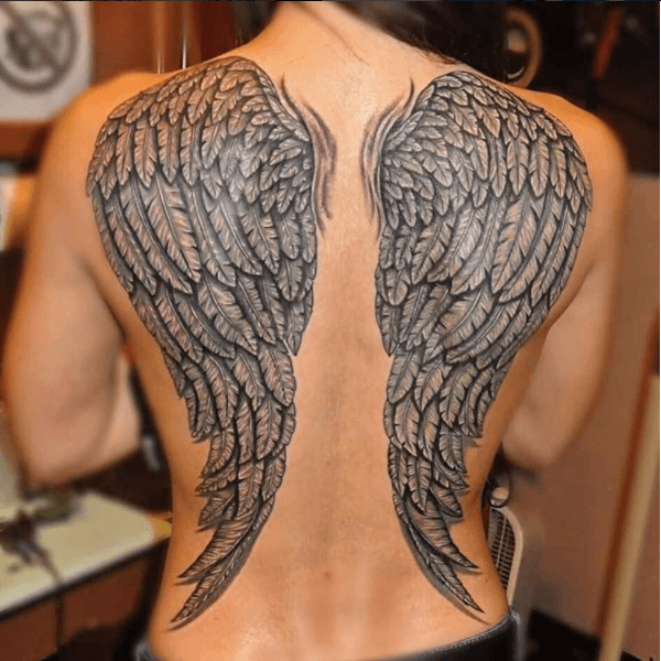 half demon half angel wings tattoo