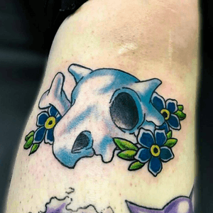 Awesome bone and flower tattoo by deanna_tattoos #cubone #skull #flower #pokemon #pokemongo #gottacatchemall #color #anime #bodymods #bodyart #ink #stencilstuff #truetubes #truegrips #cheyennehawk #hawkspirit #cheyennetattooequipment #pokemontattoo #neotraditional #fusionink #fkirons #gamerink #geeksterink #vgta2 #sunnysidetattoo 
