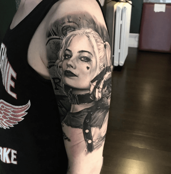 Female Joker Tattoo On Shoulder