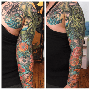 Finally finished!! Originally started in 2012, cover up, and appropriately titled by the client as 'Cthulhu in tropical paradise' with begonia flowers and Cthulhu flowers 🌺 #noblehandtattoo #rhodeislandtattooer #cthulhutattoo