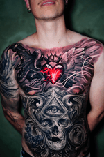 Heart, Winged, and Skull Chest Tattoo