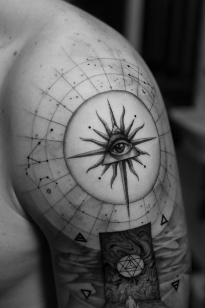 Light Grays expertly combines micro-realism, geometric shapes, and fine lines to create a stunning tattoo featuring a sun, constellation, star chart, and eye.