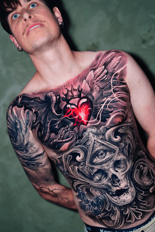 Heart, Winged, and Skull Chest Tattoo