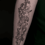 A black and gray neo-traditional illustration of a sword, expertly crafted by Kat Jennings using dotwork