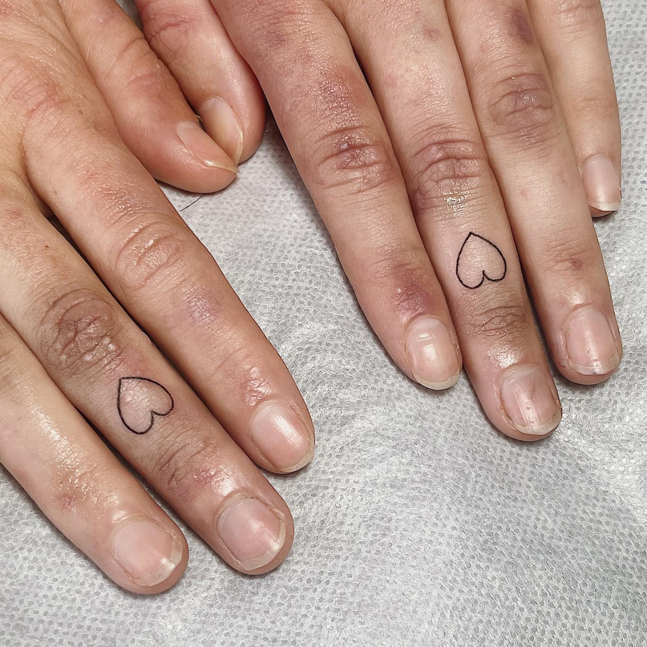 Heart Ring Tattoos on Fingers: Soft & Stylish