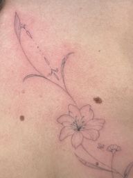 Floral and Ornamental Fine Line Tattoo