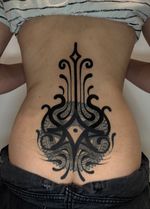 Ornate Lower Back Tattoo