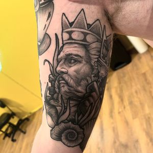 Impressive black & gray dotwork tattoo of Poseidon, the king of the sea, beautifully rendered by Lawrence Canham in neo traditional style.