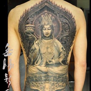 Buddha tattoos would always look grand & elegant. Tattoo by Yue Heng.