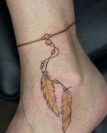 One of my regulars came in today and asked for a bracelet with peacock feathers and a regular feather and the she said in gold 🤘🤘 #tattooshop #tatt #tattooartist #tattoo #tattooed #tattoos #goldtattoo #propertattooaftercare #717tattoo #717tattoomechanicsburg