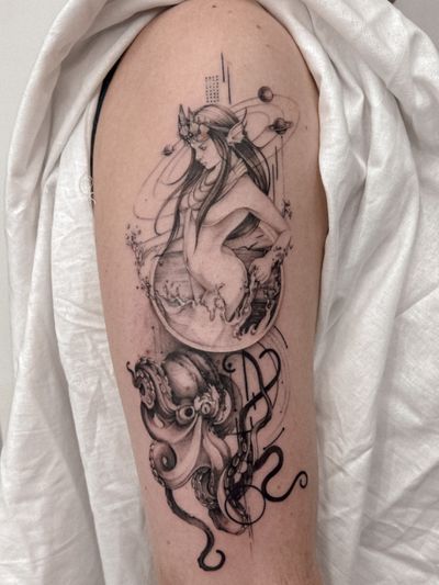 Stunning black and gray tattoo by Alex Caldeira featuring an intricate design of an octopus, mermaid, and planet inspired by the ocean.