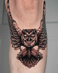 owl tattoo on leg