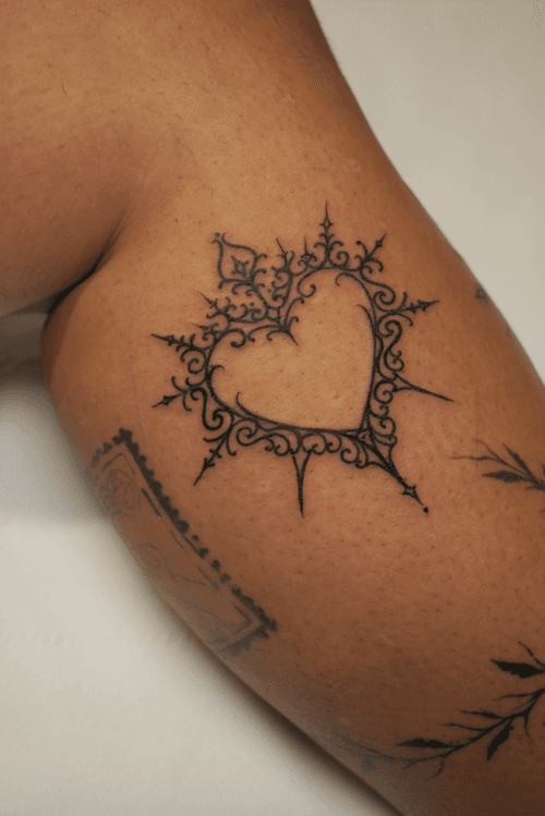 Decorative Heartburst Tattoo