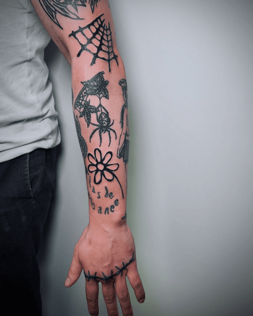 Hand Stitches Tattoo