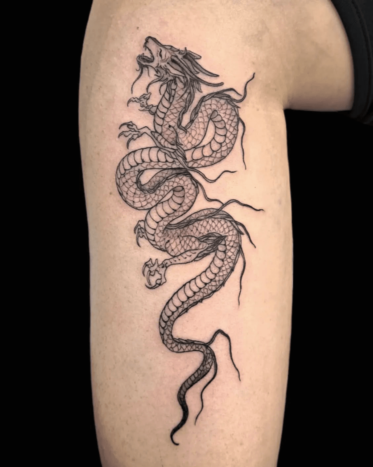ornamental leg tattoo