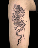 Winding Dragon Arm Tattoo