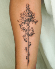 Ornate Sword with Foliage Tattoo