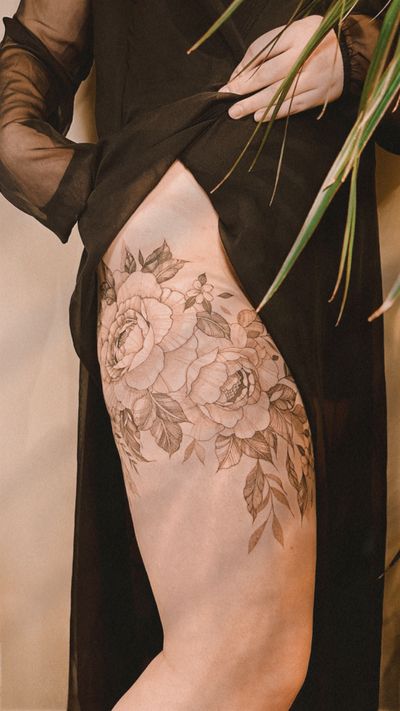 Fine line florals on the thigh 