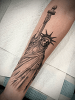 Statue of Liberty Arm Tattoo