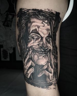Stylised joker tattoo