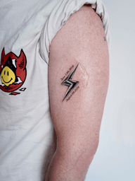Memorial tattoo of his dog named Zeus⚡️ A chrome lighting bolt with his birth date and the day he passed