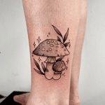 blackwork witchy mushroom tattoo