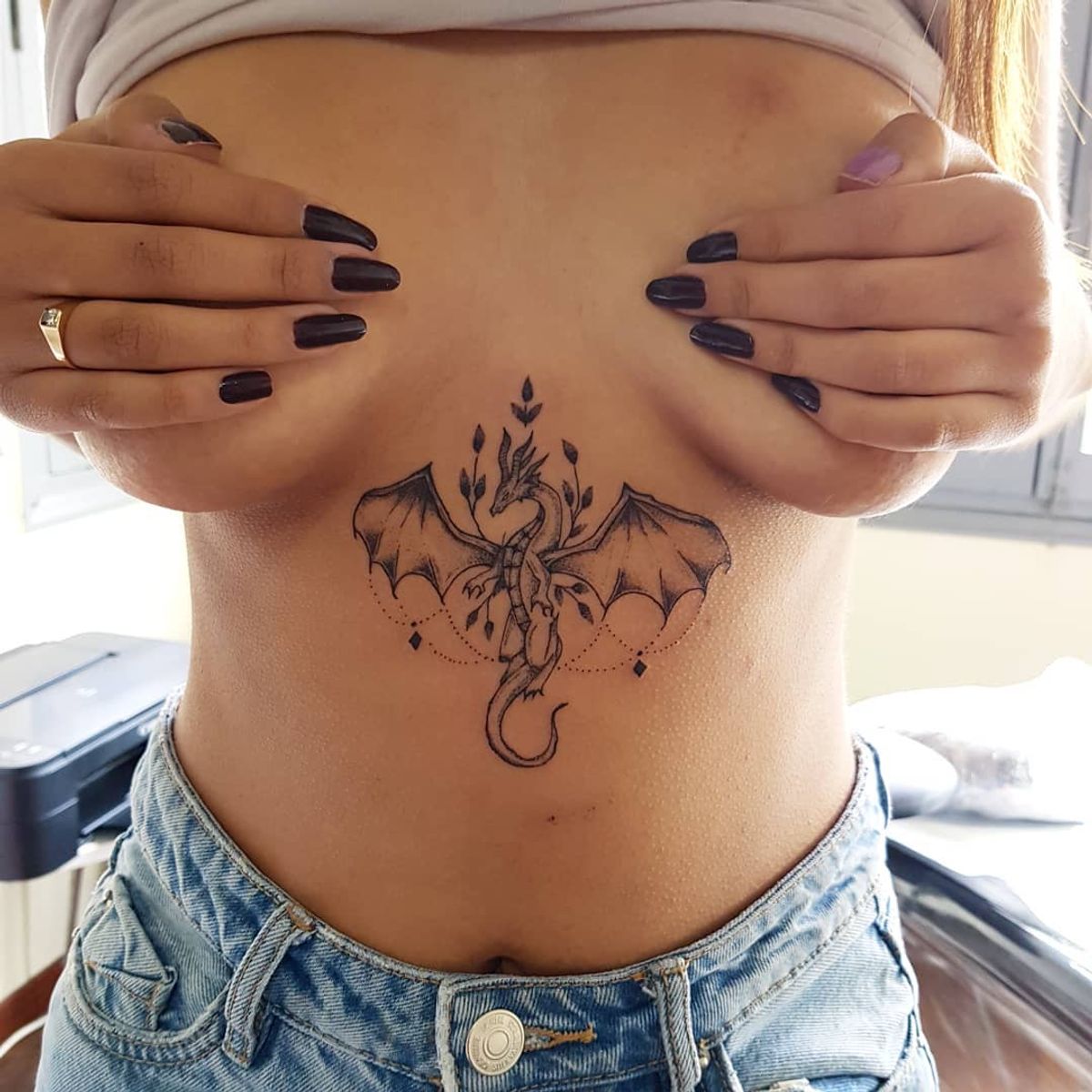 flowing ribbon tattoo
