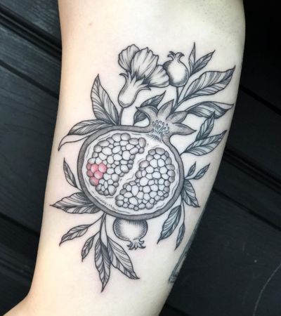 Get a stunning tattoo of a pomegranate tree with intricate branches by artist Amandine Canata. Perfect for nature lovers!