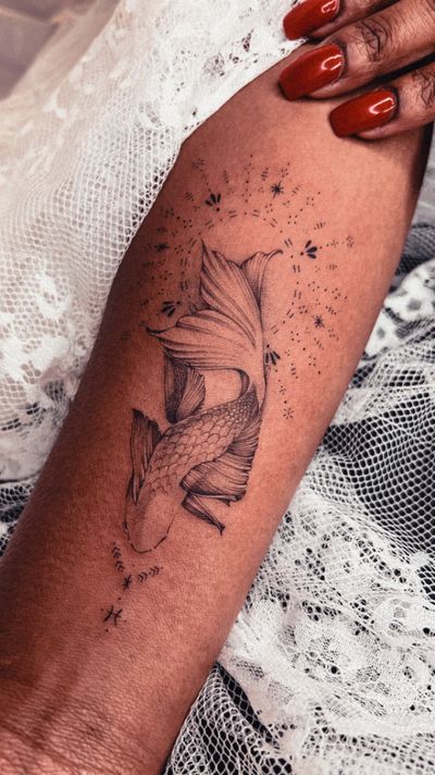 Experience the beauty of ornamental anime style with this stunning fish motif tattoo by talented artist Alex Caldeira.