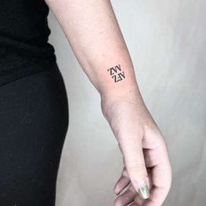 Small lettering tattoo style