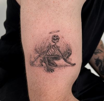 Express your dark side with an illustrative black and grey death motif tattoo by the talented Jo Heatley.