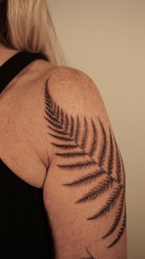Fern tattoo on shoulder 