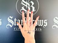 Butterfly and Script Hand Tattoo