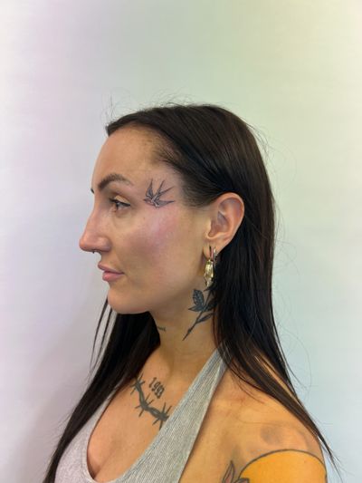 Delicate face tattoo for the beautiful Rachel