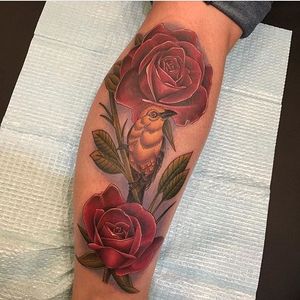 Beautiful neo traditional rose and feathered friend Elvis did the other day! #neotrad #colortattoo #rosetattoo #birdtattoo #legtattoo #ascensionbodymod #color #rose #bird #neotraditional