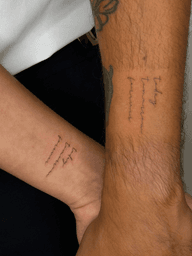 Matching Script Tattoos