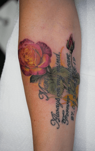 Full colour realism flower rework / cover up tattoo