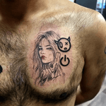 Woman Holding a Gun Tattoo