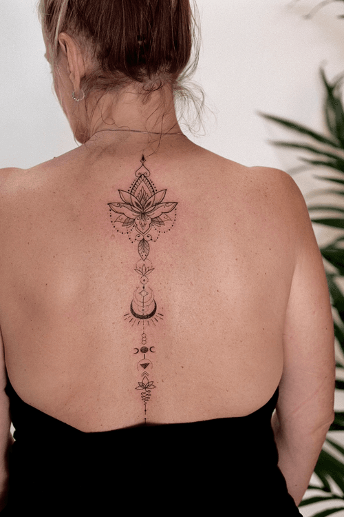 Spine Lotus Tattoo