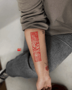 Red Stamp Tattoo