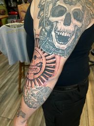 Aztec Sun Stone Tattoo