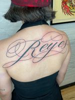Reyes script tattoo