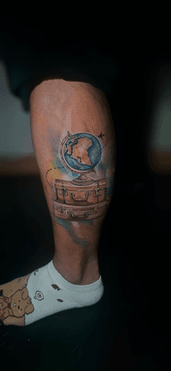 Traveler's Globe and Suitcases