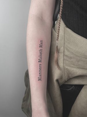 Capture minimalist beauty with Alina Amberland's exquisite small lettering tattoo design. Perfect for a subtle yet impactful statement.